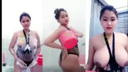 Wiwin Mandi Dengan Payudara Besar Yang Menggoda